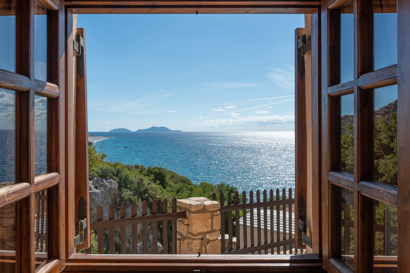 Villa Maria room window framing the Libyan Sea