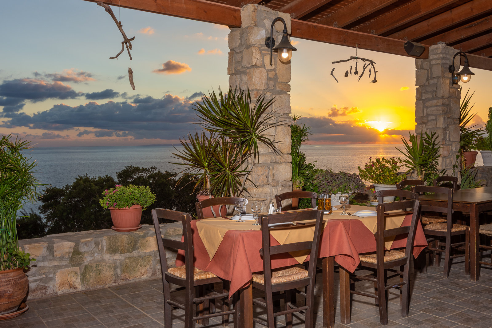 Restaurant terrace at sunset overlooking the Libyan Sea